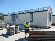 TR Homes 'Made using BlueScope Steel' - archival photograph