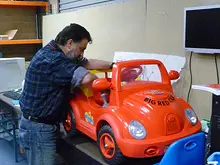Aussie Electric Ride on Cars & Budget Computers - archival photograph