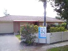 Nora Allen's Home Sales - archival photograph