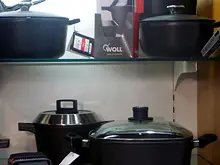 Kitchen Witch 'Woll Cookware' - archival photograph