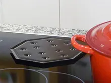 Kitchen Witch 'Simmermat-Flame Diffuser' - archival photograph