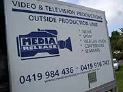 Auction Coverage By “Media Release" - archival photograph